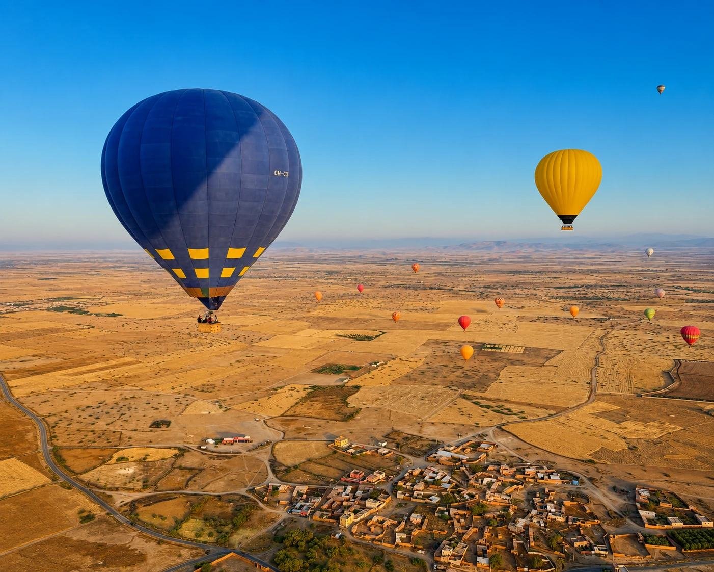 Private hot air balloon flight over villages and fields near Marrakech