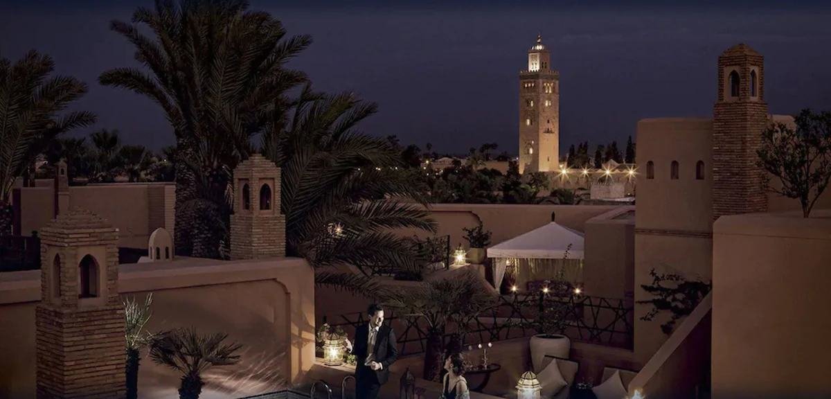 Rooftop terrace at night facing the Koutoubia minaret in Marrakech